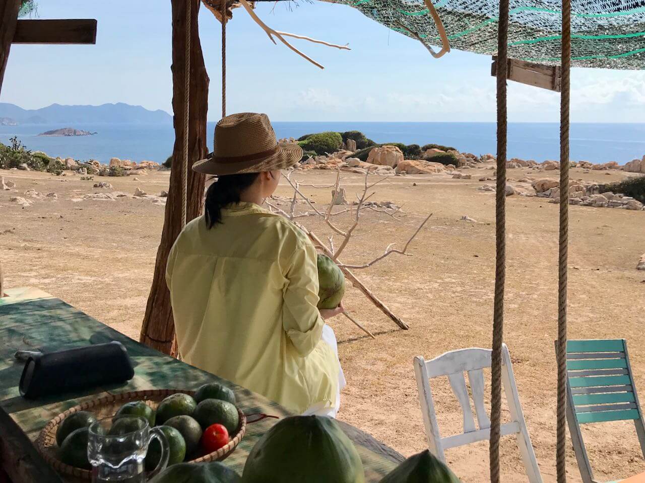 Woman Enjoying Refreshing Coconut At Stone Park Bar, Rua Da Cafe