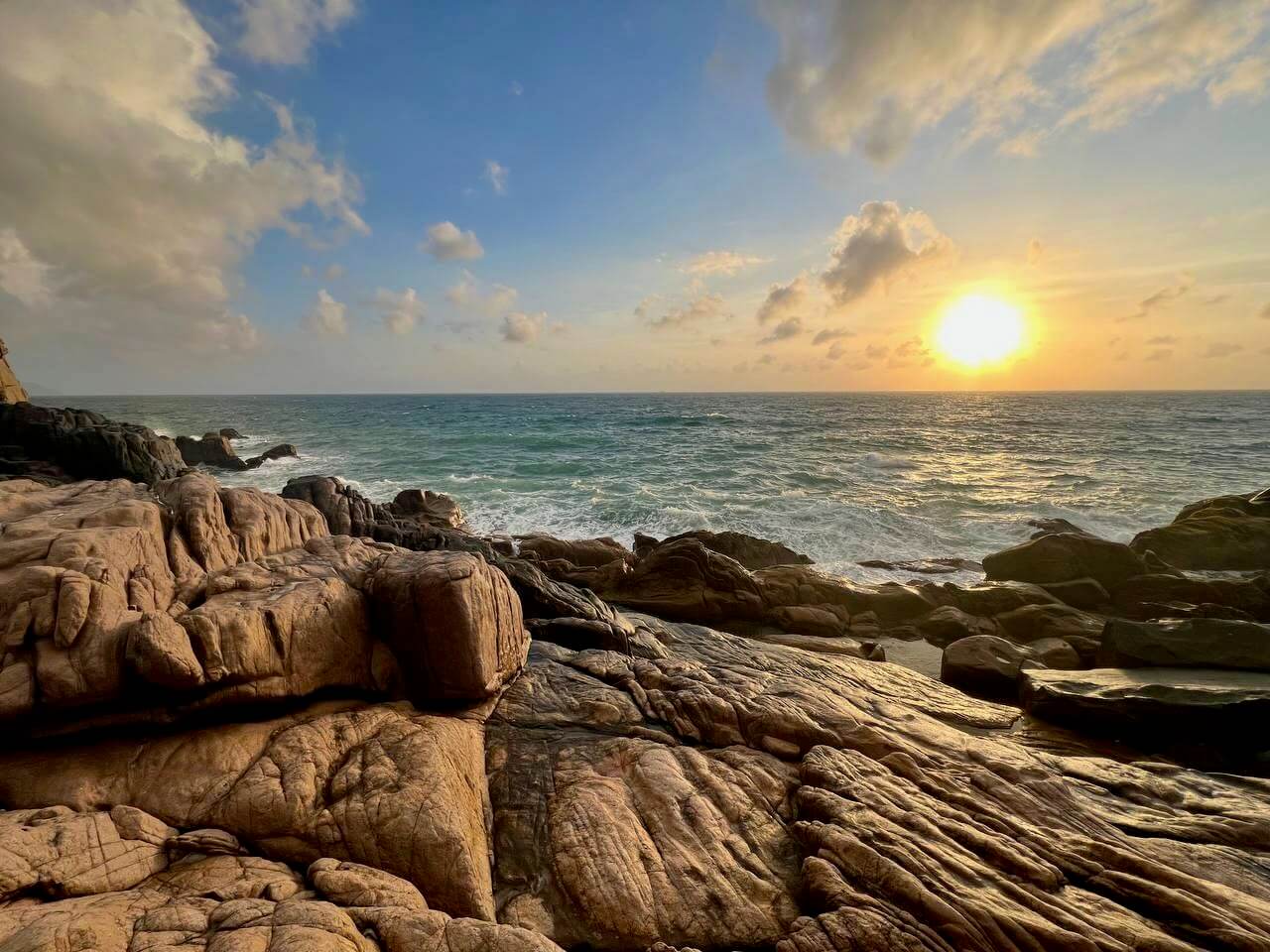 Sunrise At Stone Park with Rock Formations And Ocean Background